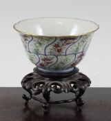 A Chinese famille rose bowl, Republic period, painted with lotus petal shaped reserves of orchids