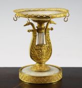 A 19th century Palais Royale ormolu and mother of pearl ring stand, modelled as a harp, on