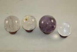 A selection of eight Madagascar and other spheres, comprising two yellow quartz; three rock crystals