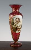 A Bohemian enamelled and gilt decorated ruby glass vase, late 19th century, with an oval reserve