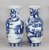 A pair of large Chinese blue and white ovoid vases, each painted with figures in river landscapes