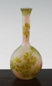 A Galle cameo etched flask shaped bottle vase, c.1910, decorated with green foliage and flowers on a