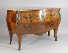 A Louis XV design bombe shaped commode, with marble top, marquetry kingwood and gilt brass mounts,