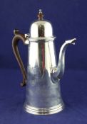 A 1970`s Queen Anne design coffee pot, with turned finial and scroll handle, Nat Leslie Ltd, London,