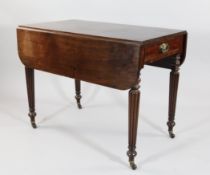 A Regency mahogany Pembroke table, with drop leaves, on tapering gadrooned supports, W.3ft 3in.