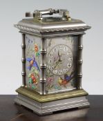 A late Victorian aesthetic movement silvered brass hour repeating carriage clock, decorated with