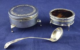 A George V silver and tortoiseshell mounted oval trinket box, on cabriole legs, Adie Brothers Ltd,