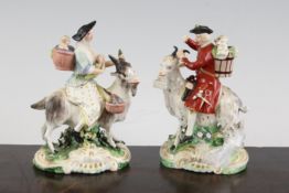 A pair of Derby groups of The Tailor of Gloucester and his wife riding goats, flower encrusted
