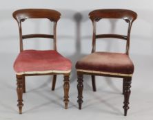 A set of eight Victorian mahogany dining chairs, with curved crest rails and spars, on splat