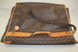 A Louis Vuitton suit bag Starting Price: £96