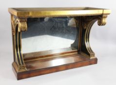 A French Empire style ebonised parcel gilt and birds eye maple console table with recessed mirror