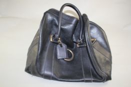 A black leather Versace large handbag Starting Price: £96
