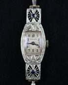 A lady`s 1920`s 18ct white gold, diamond and sapphire set Rolex cocktail watch, of tonneau form,