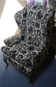 A similar wingback armchair Starting Price: £64