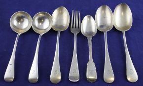 Six items of Edwardian silver flatware and a Victorian spoon, various dates and makers, 15 oz.