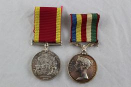 An 1861 Second China War medal and a China War medal 1900 the former unnamed, the later to a sepoy