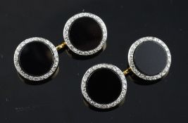 A pair of 1920`s/1930`s French 18ct gold, onyx and diamond circular cufflinks by Cartier, Paris,