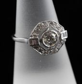 An Art Deco style 18ct white gold and diamond dress ring, total diamond weight approximately 0.90ct,