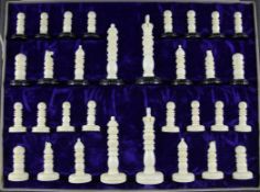 A large Indian carved ivory chess set, king 4in.; in original case Starting Price: £200