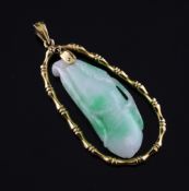 A 14ct gold mounted carved jadeite gourd pendant, 2in. Starting Price: £240