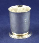 An early 20th century French 950 standard silver beaker, by Jean Puiforcat, Paris, of plain