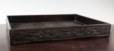 A Chinese Hongmu rectangular tray, 19th century, the sides carved in relief with lotus flowers and