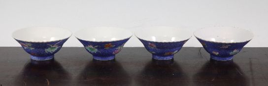 A set of four Chinese famille rose petal edged bowls, Republic period, each painted to the