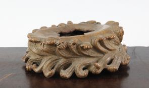 A Chinese bamboo brush washer, modelled as a curled lotus leaf with waves lapping around the side