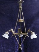 A continental ormolu three branch electrolier, modelled as three joined arrows with frosted glass