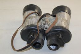 A pair of Carl Zeiss WWII German U boat binoculars, marked 7 x 50 BLC and 55608, with rubber