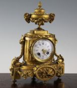 A late 19th century French ormolu mantel clock, with enamelled Roman dial and Vincenti & Co