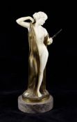 Ferdinand Preiss (1882-1943). An Art Deco gilt bronze and ivory figure `Vanity`, modelled as a