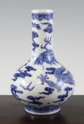 A Chinese blue and white `dragon and phoenix` vase, Qianlong mark but later, 8.5in. Starting