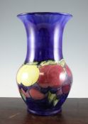 A Moorcroft `Wisteria` large baluster vase, c.1920, with cobalt blue ground, inscribed `W Moorcroft`