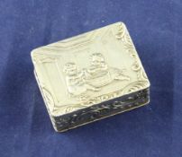 A late 19th/early 20th century Hanau silver pill box, embossed with putti with scrolling border, 1.