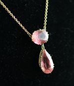 An Edwardian 15ct gold and pink tourmaline drop pendant necklace, 16in. Starting Price: £160