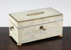 A 19th century rectangular mother of pearl tea caddy, the lid with gilt brass and enamel central