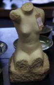 N. Odonel. A carved marble female torso, on naturalistic square base, signed, 28in. Starting