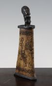 An unusual South East Asian carved horn vase, with ebonised wood figural cover, probably Borneo,