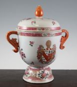 A Samson porcelain armorial cup and cover, painted in Chinese famille rose style with a crest and