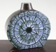 A Troika wheel vase, the front decorated in pale blue, white and green mottled glaze with a