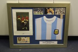 Diego Maradona. An Argentinian Football Association shirt framed with photographs, one signed