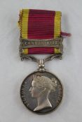 An unnamed 1861 Second China War medal with Canton 1857 clasp Starting Price: £80