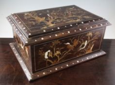 An Indian padouk bone and marquetry inlaid casket, decorated with birds and branches, 20in. Starting