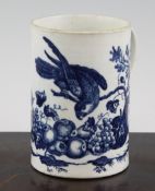 A Worcester cylindrical mug, c.1775, printed in blue with the parrot and fruit pattern, 4.8in.