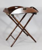 A 19th century mahogany butler`s tray, with hinged sides and folding base, W.2ft 9.5in. Starting