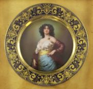 A Vienna style porcelain cabinet plate, circa 1900, painted with a raven haired lady wearing a satin