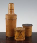 A treen drum shaped money box, a similar circular powder box and a treen bottle shaped container,