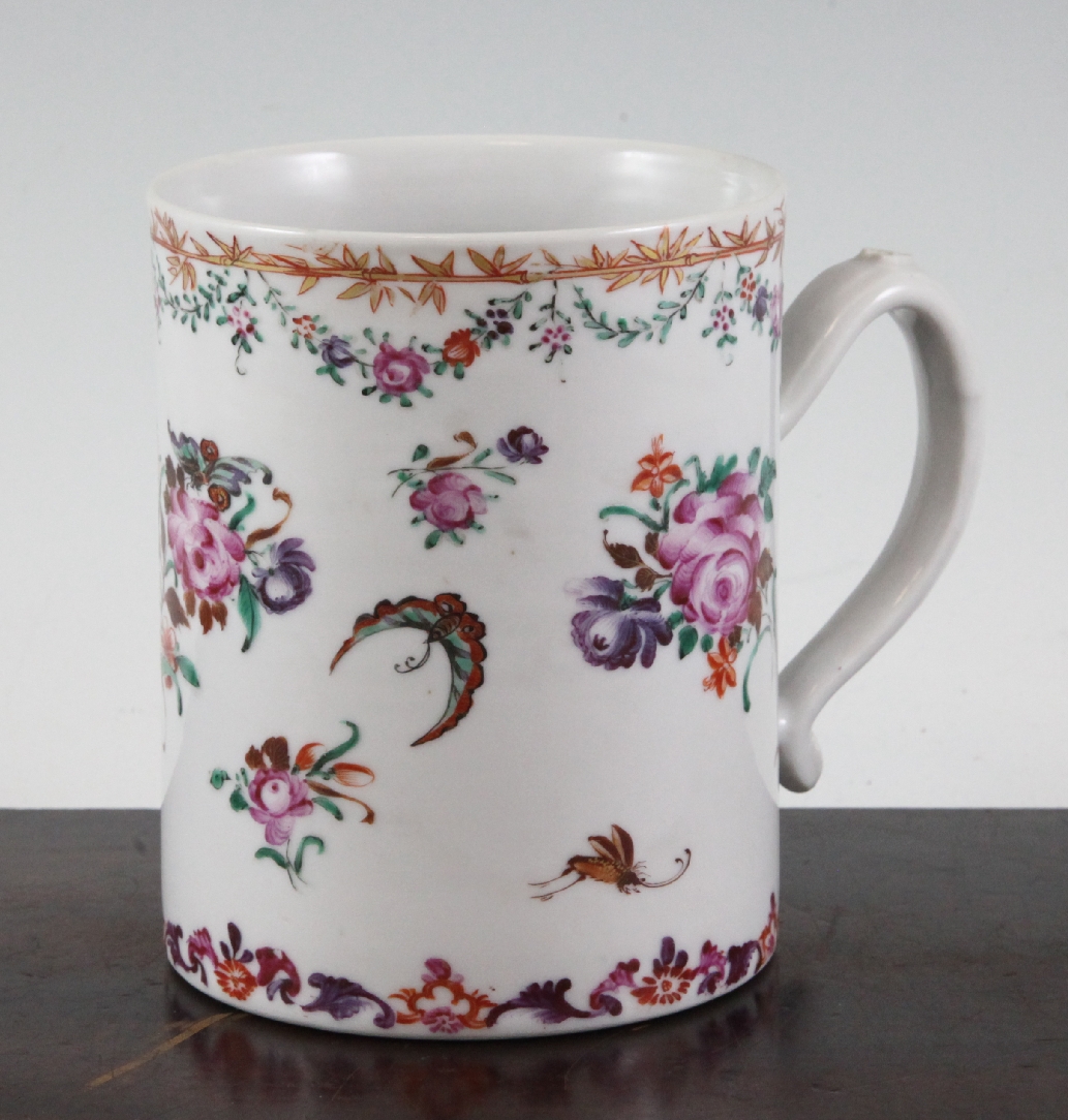 A Chinese export famille rose large mug, painted with insects amid sprays of flowers, bamboo and