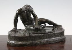 After the Antique. An Italian serpentine marble figure of The Dying Gaul, on oval base 13.5in.